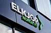 Elkjøp-logo på butikkfasade med grønn dekor og glassvinduer i Nydalen, Oslo.