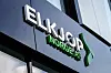 Elkjøp-logo på butikkfasade med grønn dekor og glassvinduer i Nydalen, Oslo.